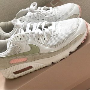 White, pink and olive green Nikes